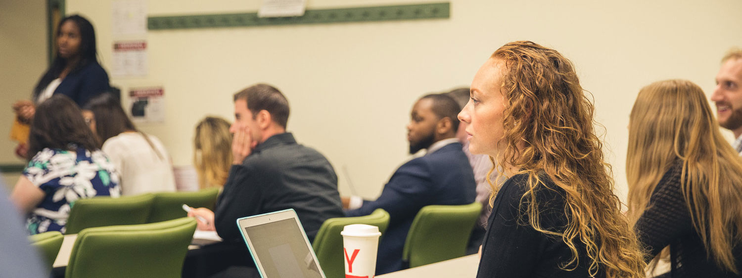 Students listen during a class at Regent University, Virginia Beach.