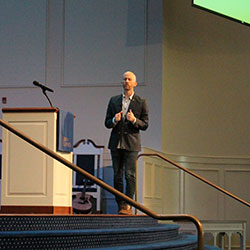 Adam Mabry, lead pastor of Alethia church speaks at Regent University’s weekly chapel service.