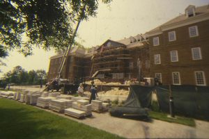 Construction workers put finishing touches on the building.