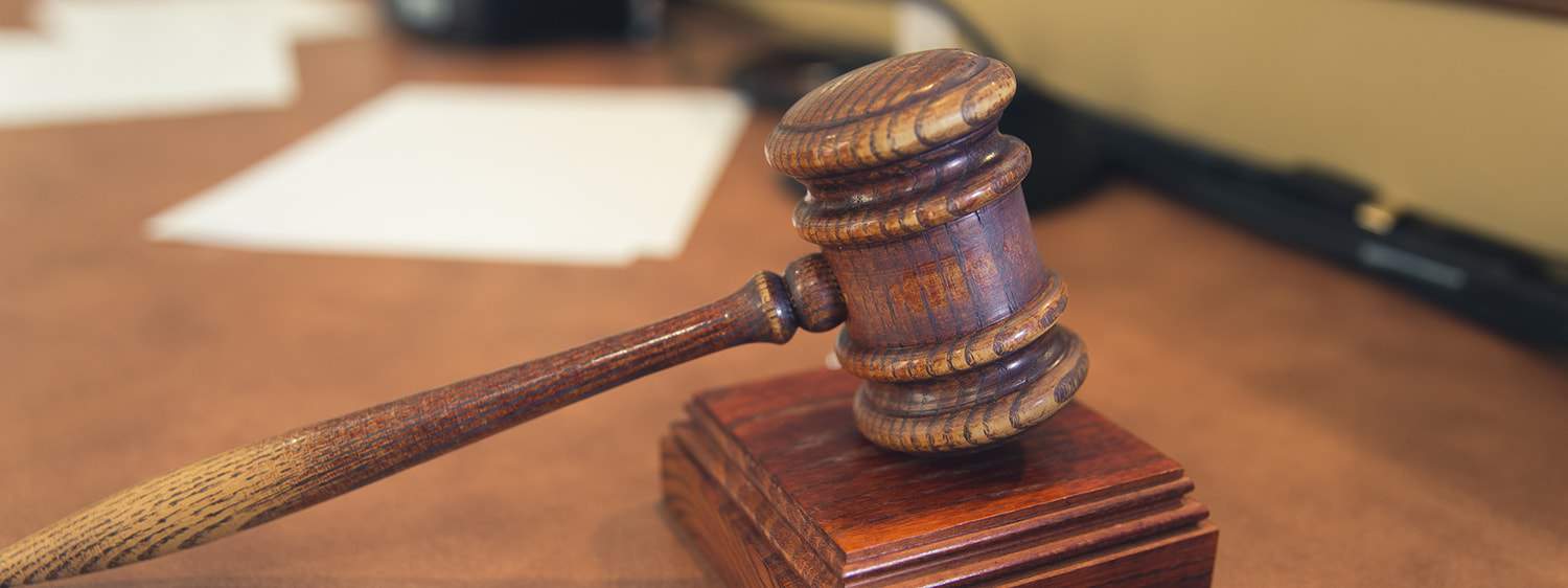 A gavel in a classroom at Regent for the Criminal Law online degree program for M.A. in Law.