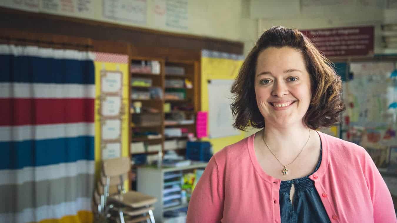 A headshot in a classroom of an alumna Regent University's Doctor of Education (Ed.D.) – Educational Psychology degree program