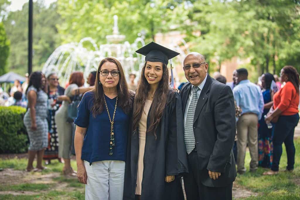 A Regent graduate with her family.