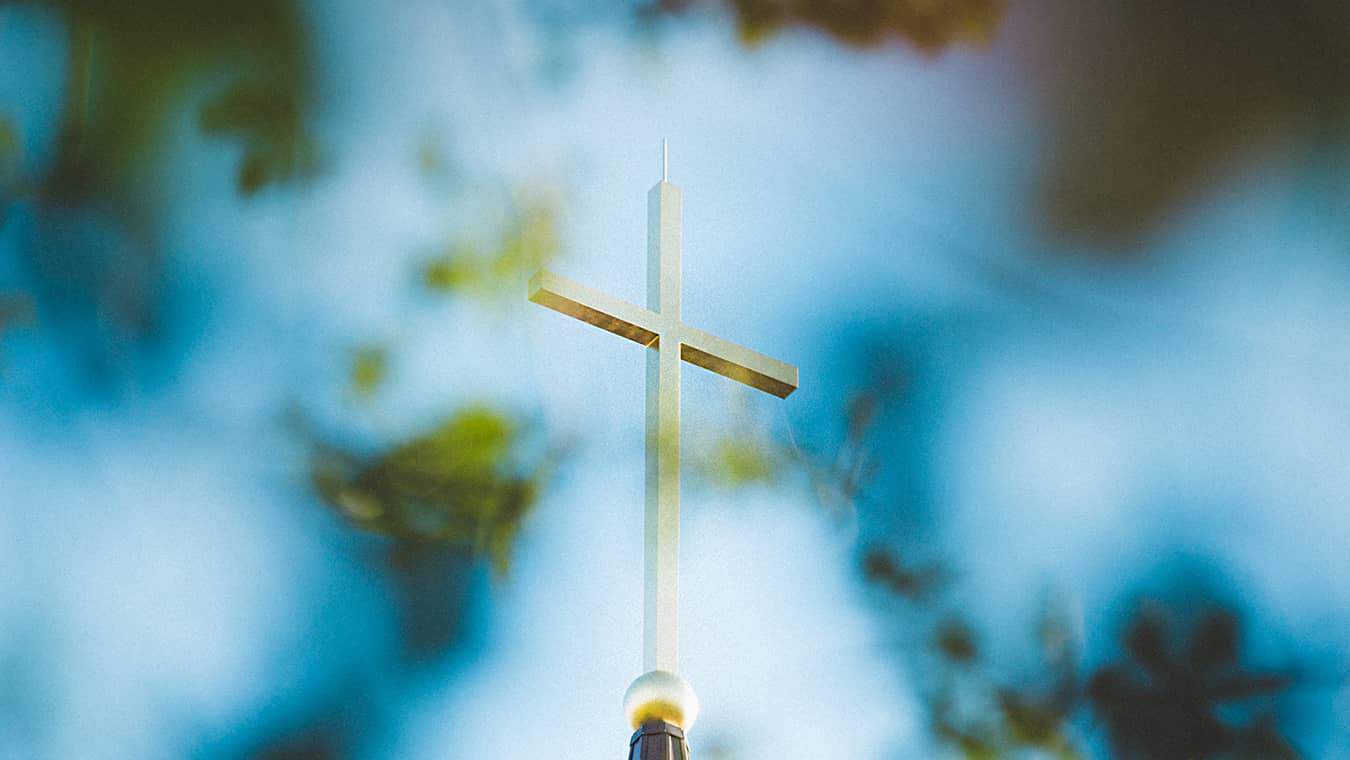 The Cross on Regent's chapel steeple: Pursue your MA in Church Leadership degree online at Regent University.