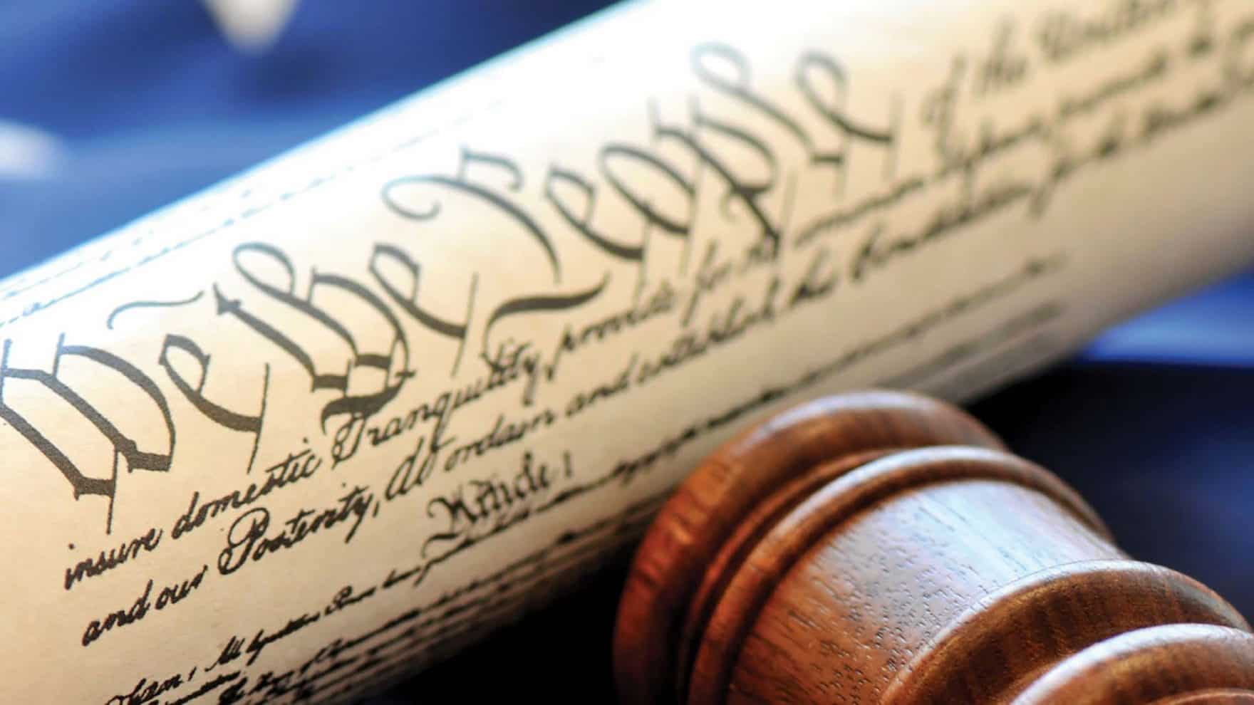 The U.S. Constitution Preamble and a gavel.