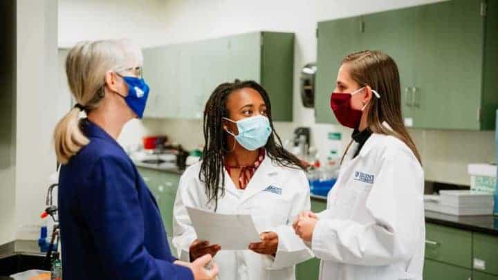 A professor and students at Regent, a premier Christian university with a nursing school in Virginia.