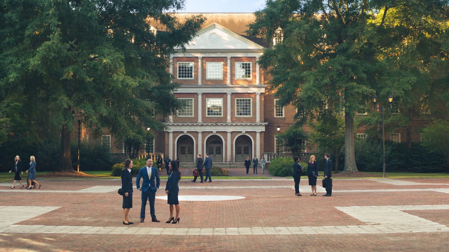 Law students having discussions outside of Robertson Hall, which houses Regent University's law school in Virginia Beach