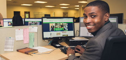 A student works on a computer at Regent University in Virginia Beach, 23464.