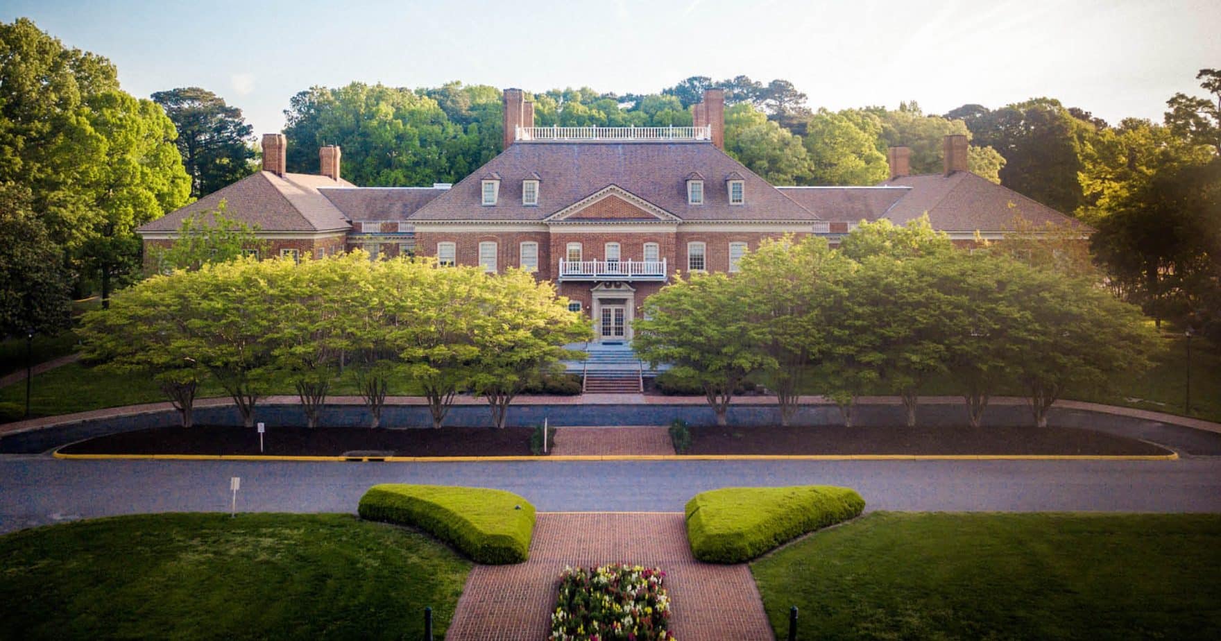 The Administration building in soft lighting on Regent University's Virginia Beach campus, which houses the university Academic Affairs office.