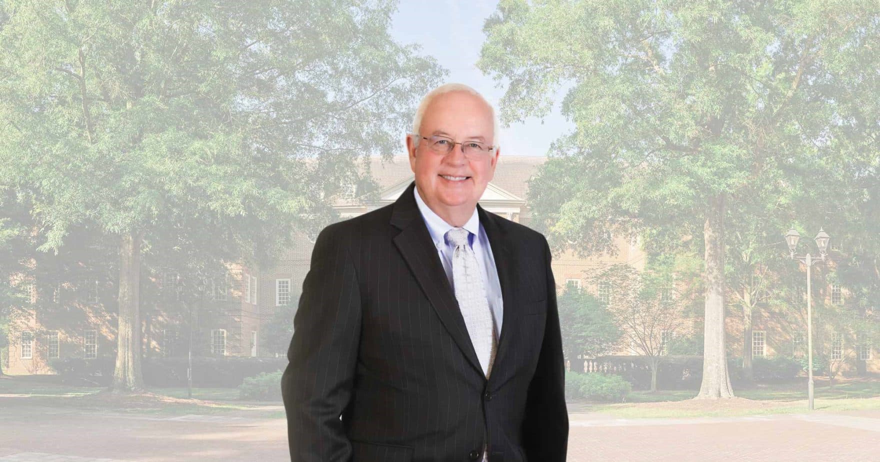 The Honorable Kenneth W. Starr, 39th Solicitor General of the US who served on the Board of Trustees and as a faculty member portrait in front of Regent University's Virginia Beach campus