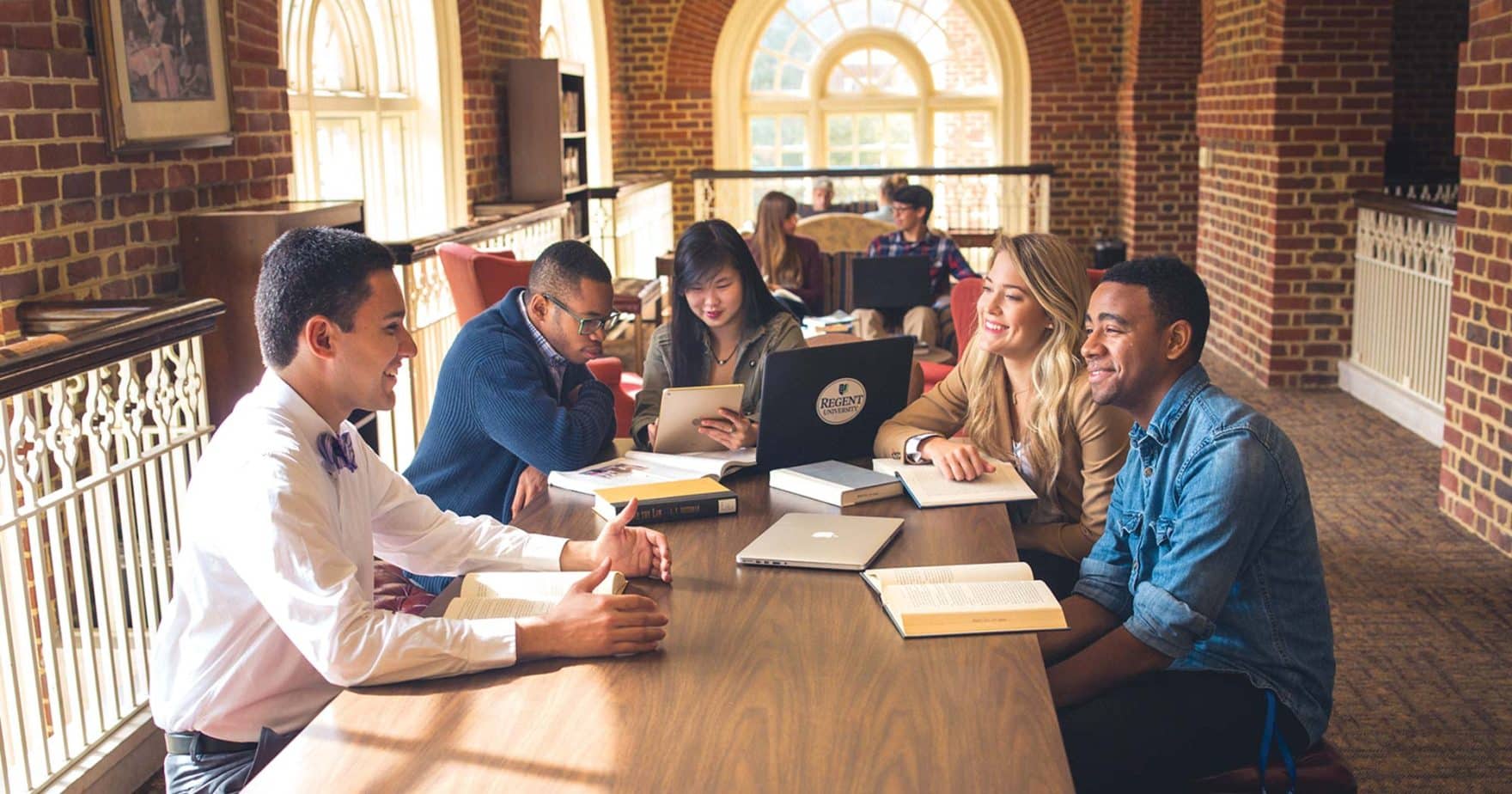 Regent University students discuss Hebrew University partnership in the Virginia Beach campus library study nook