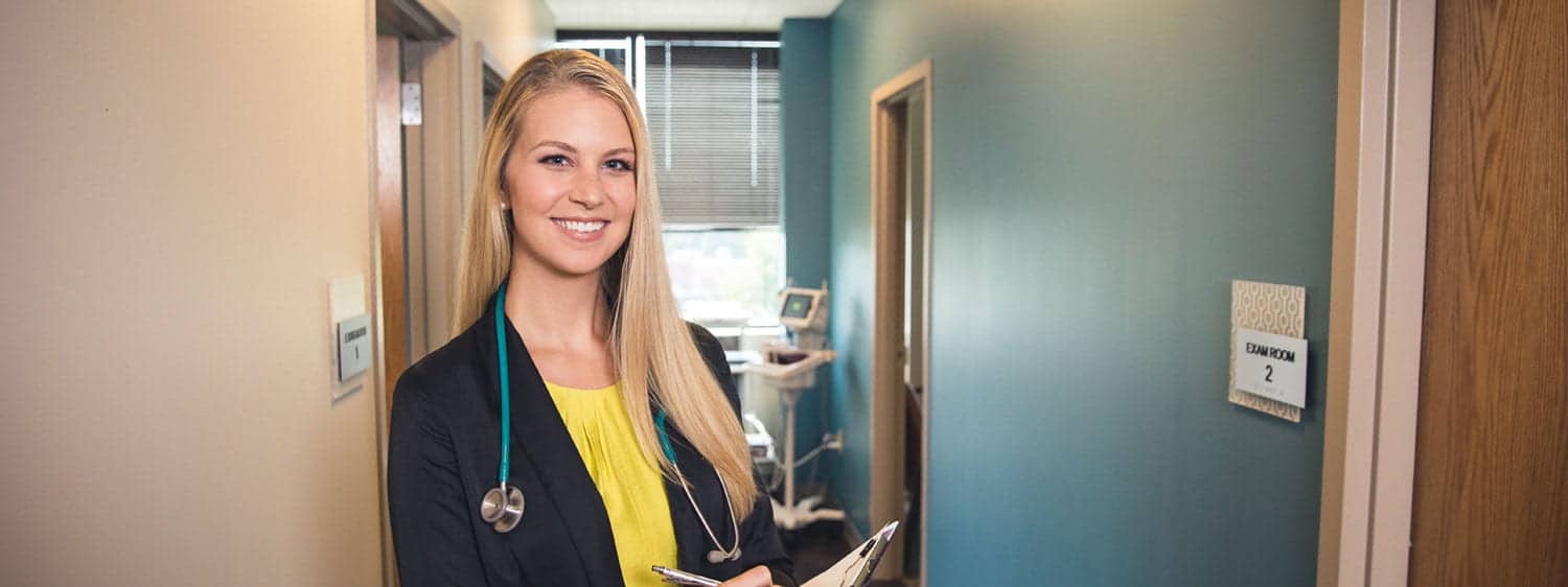 A healthcare professional: Pursue a healthcare management degree online at Regent University.