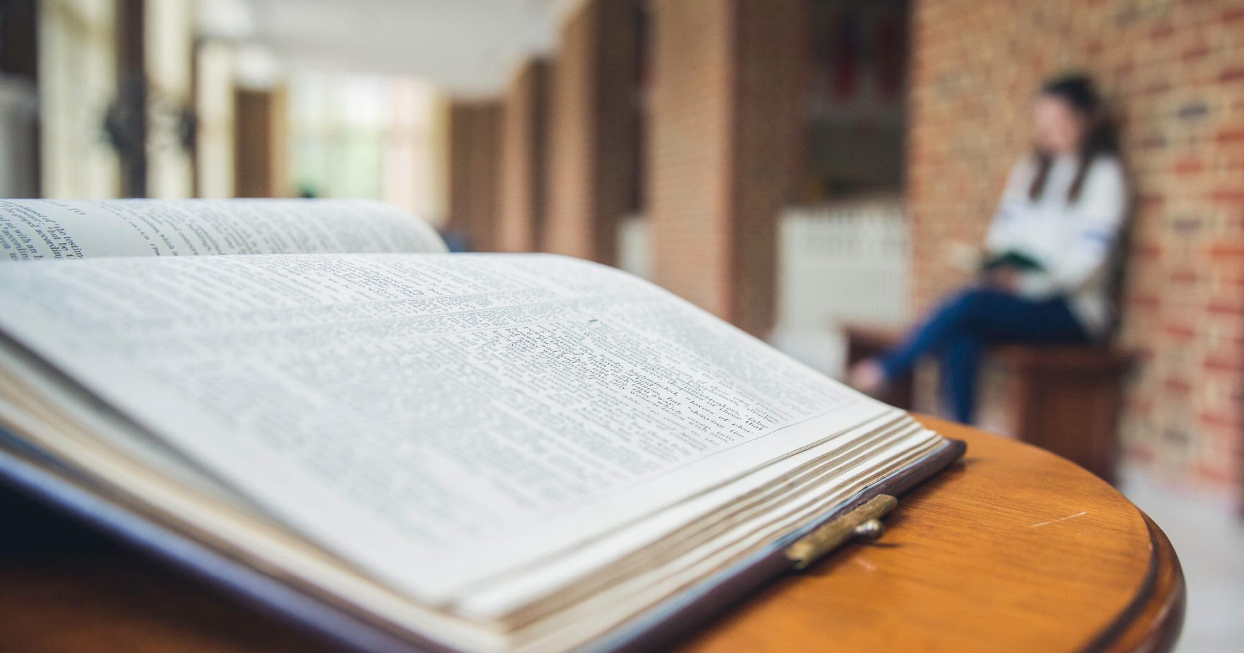 A close up of a Bible on a Table.