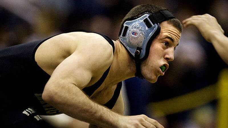 Regent University School of Divinity alumnus Aaron Runzo in the wrestling ring.