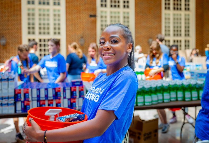 Regent Students and Operation Blessing pack disaster relief kits for Hurricane Idalia victims