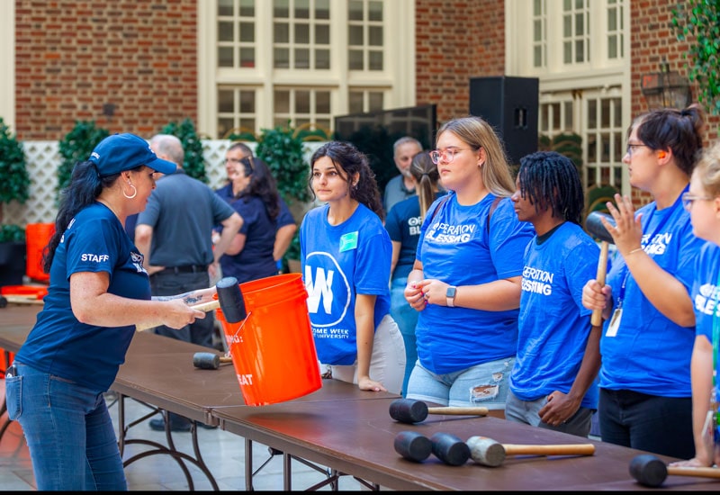 Regent Students and Operation Blessing pack disaster relief kits for Hurricane Idalia victims