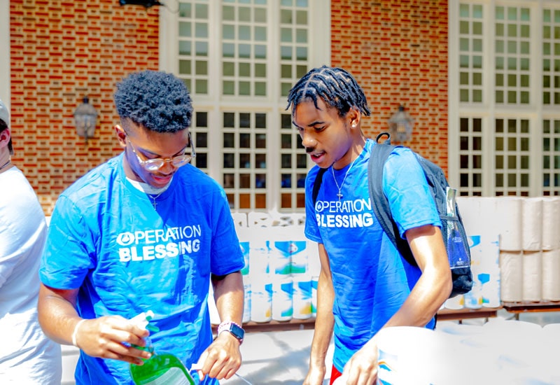 Regent Students and Operation Blessing pack disaster relief kits for Hurricane Idalia victims