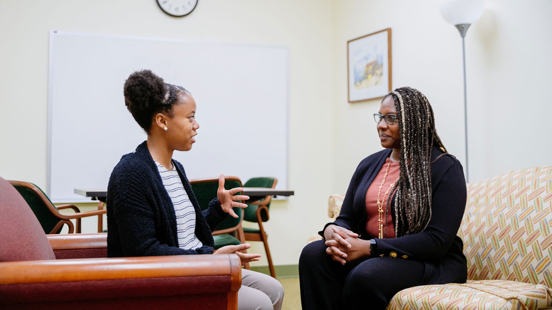 Mental health therapist helping a client.